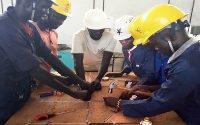 Vocational Students learning solar power installation